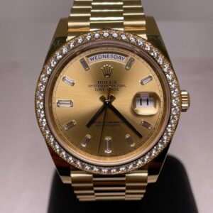 Rolex Day-Date 40 Baguette 228348RBR like new